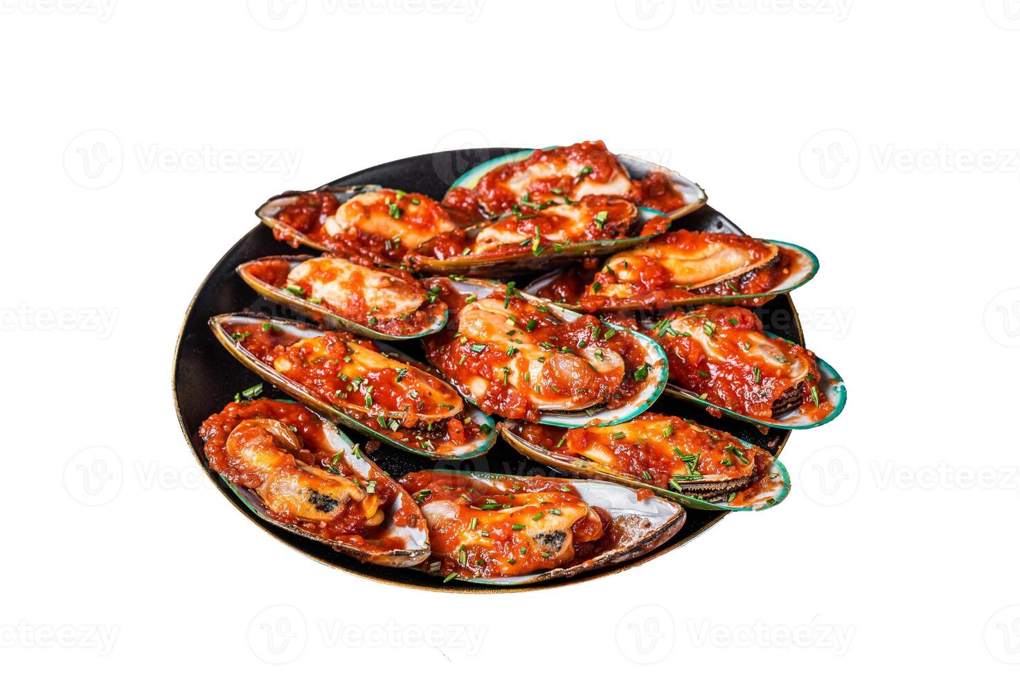 Large green mussels cooked in tomato sauce with garlic, parsley and lemon. Isolated on white background. photo
