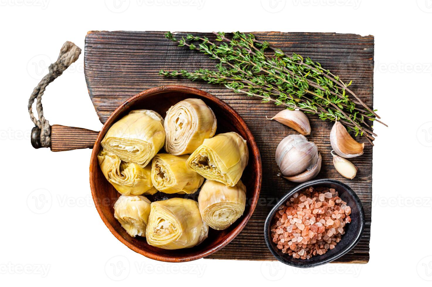 Appetizer Artichoke hearts pickled in olive oil with herbs and spices Isolated, white background. photo