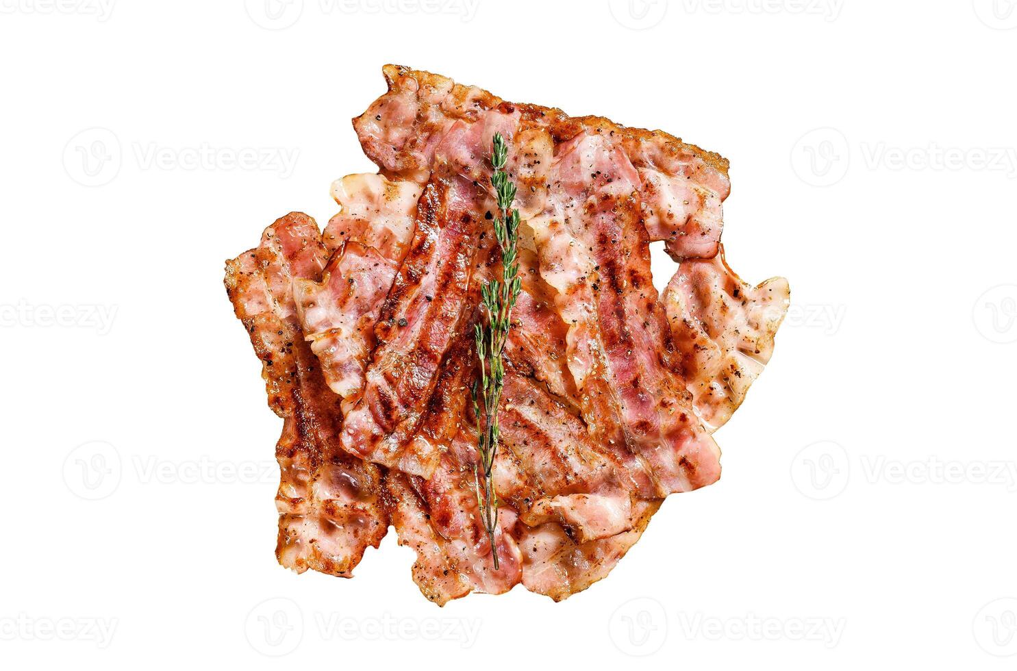 Sizzling hot bacon pieces. Organic meat. Isolated on white background. Top view. photo