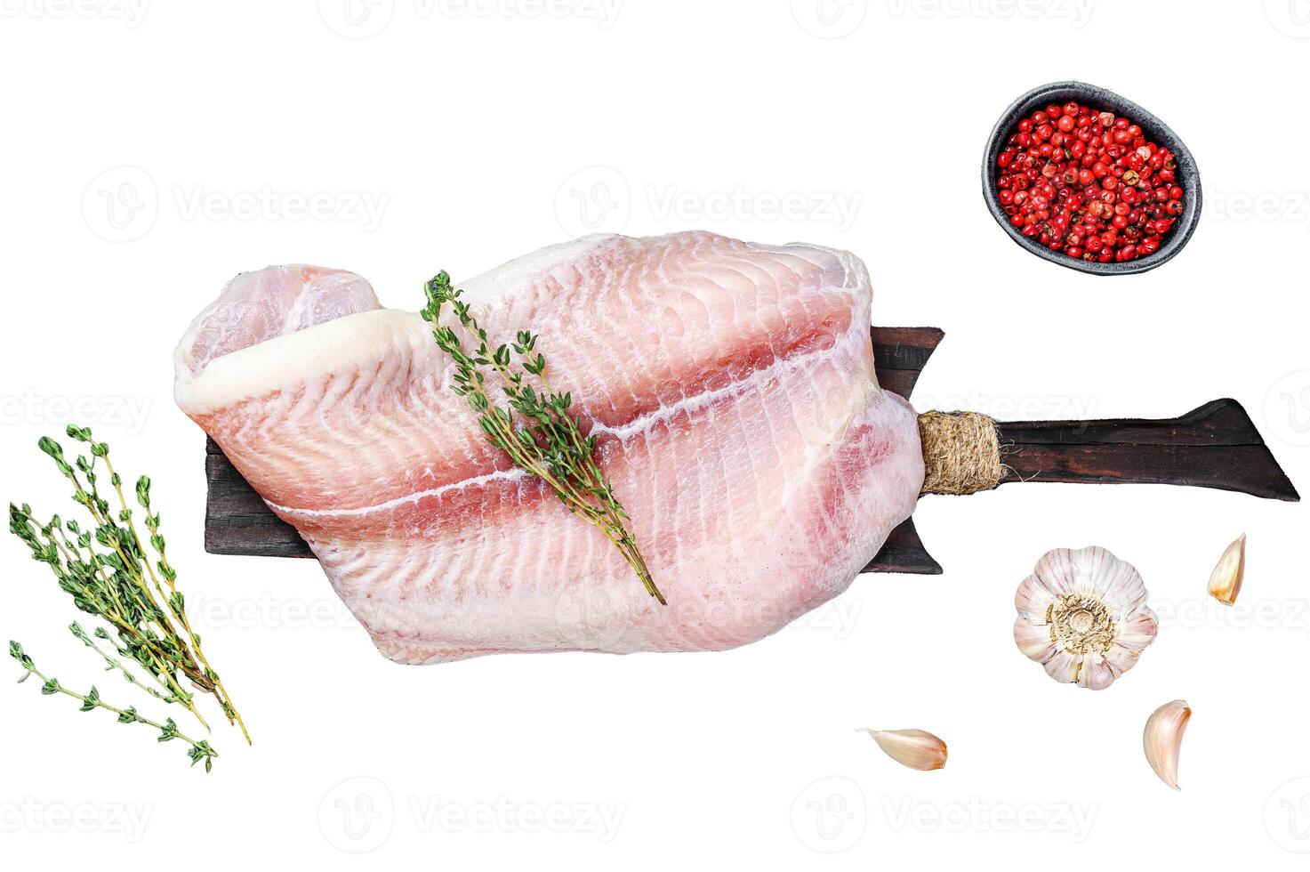Fresh raw white fish fillet Pangasius with spices. Isolated on white background. Top view. photo