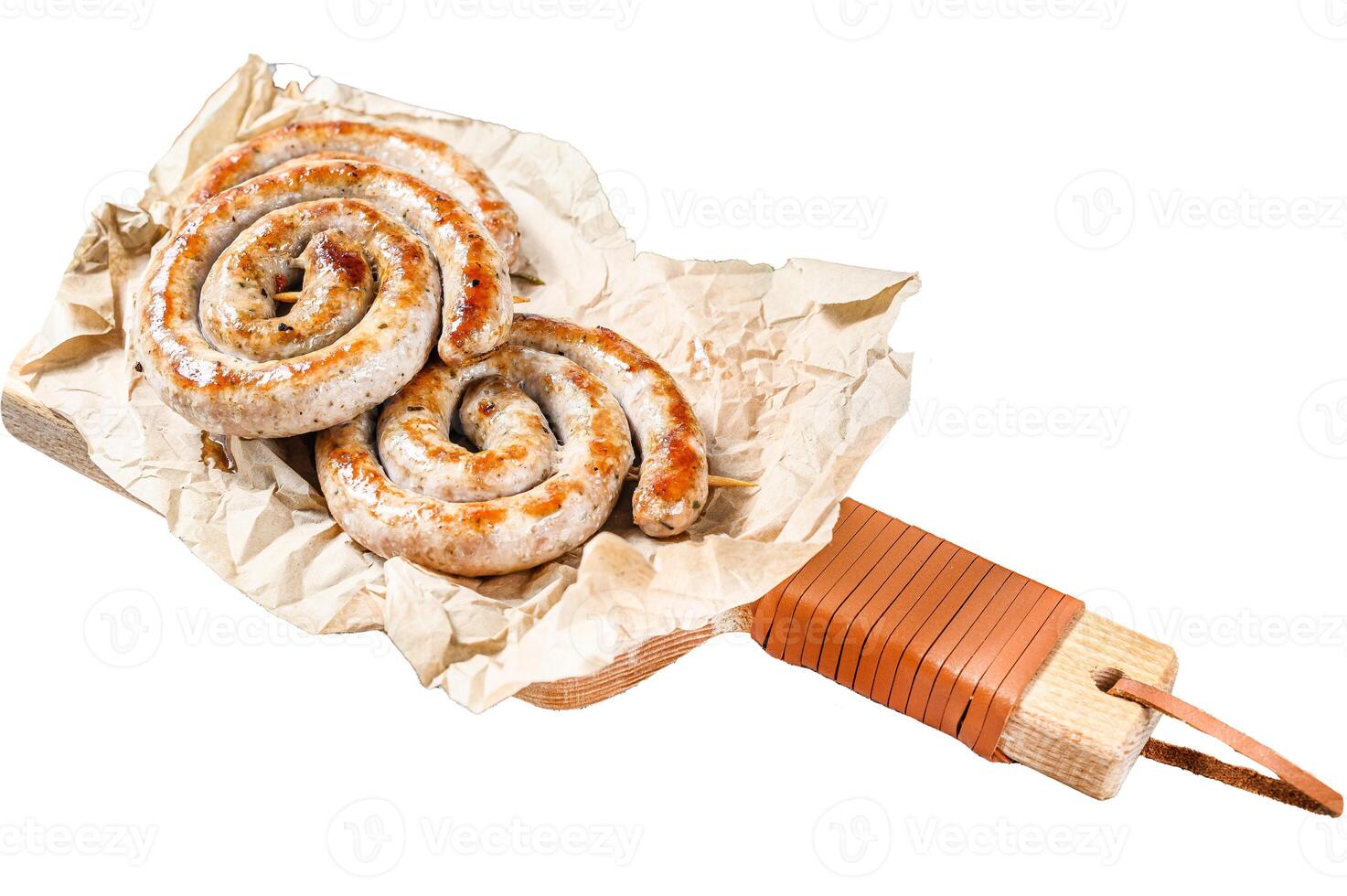 Grilled sausages spiral served on cutting board. Isolated on white background. Top view. photo