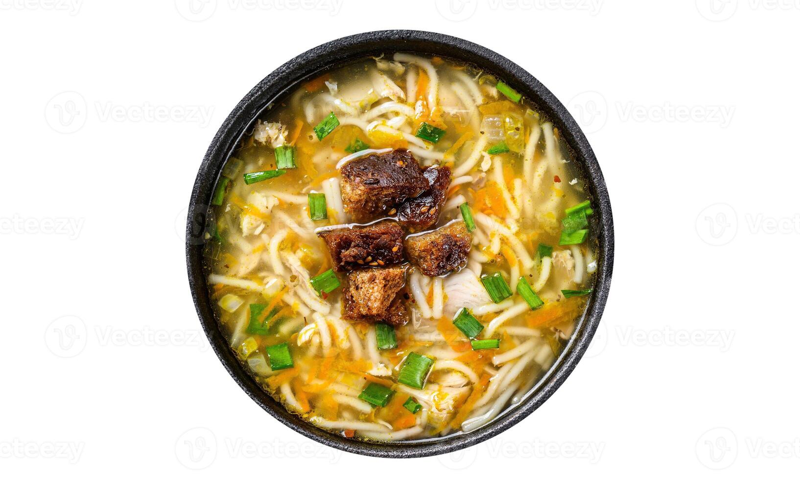 Chicken soup with noodles and vegetables. Isolated, white background. Top view. photo