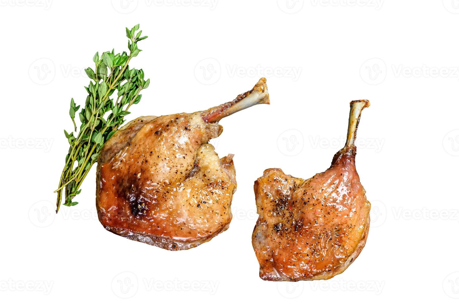 Roasted duck leg confit with cranberrie sauce. Isolated on white background, Top view. photo