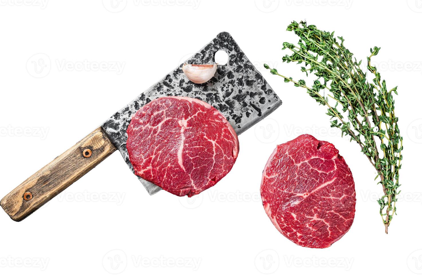 Grill BBQ - Raw Fillet Mignon beef steaks with herbs. Isolated on white background, top view. photo