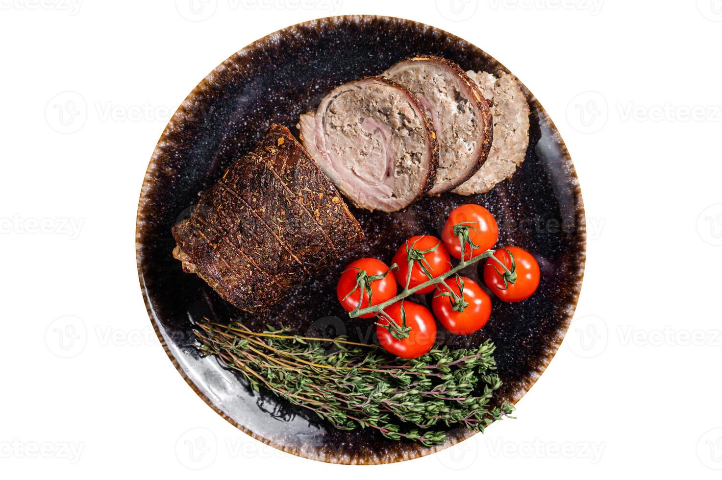 Sliced roast pork roulade - Porchetta on a plate with spices. Isolated on white background. photo