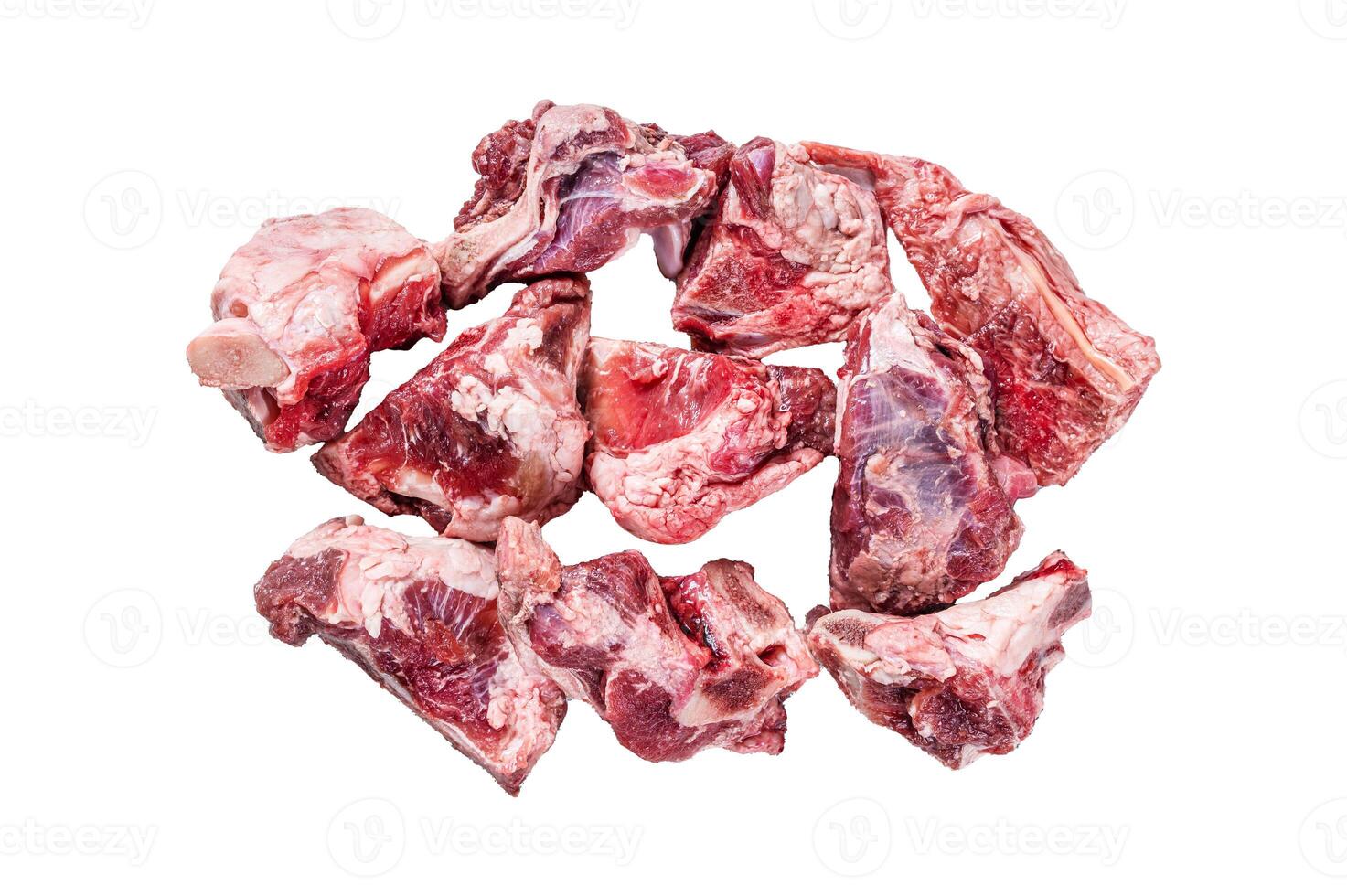 Raw lamb meat stew cuts with bone. Isolated on white background, top view. photo