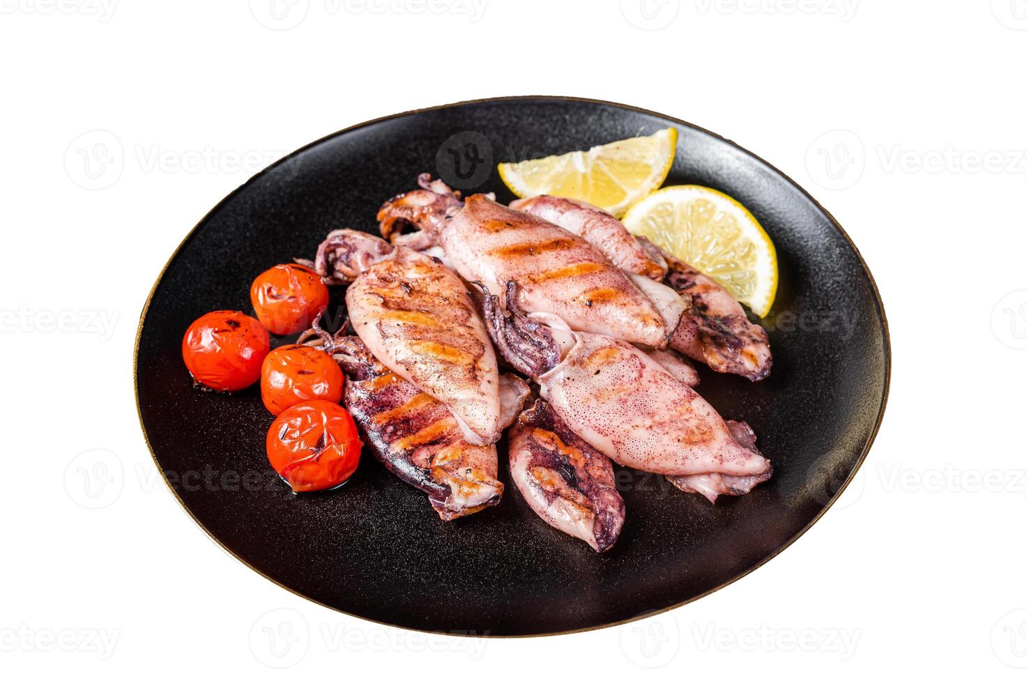 Seafood diner with grilled squid, calamary in a plate. Isolated on white background. Top view. photo