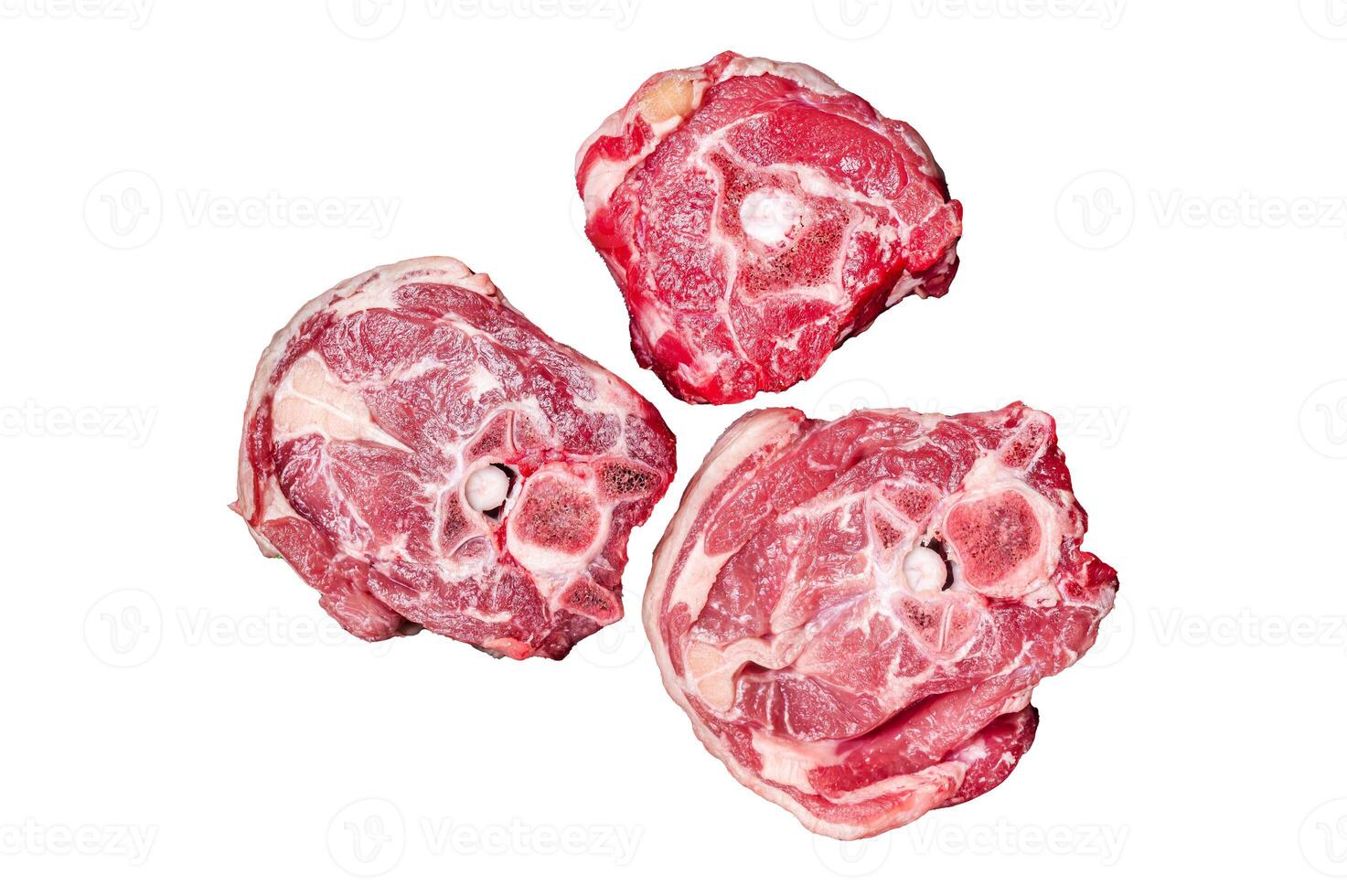 Raw Lamb Gerdan, lamb neck chops on a plate with herbs. Isolated, white background. photo