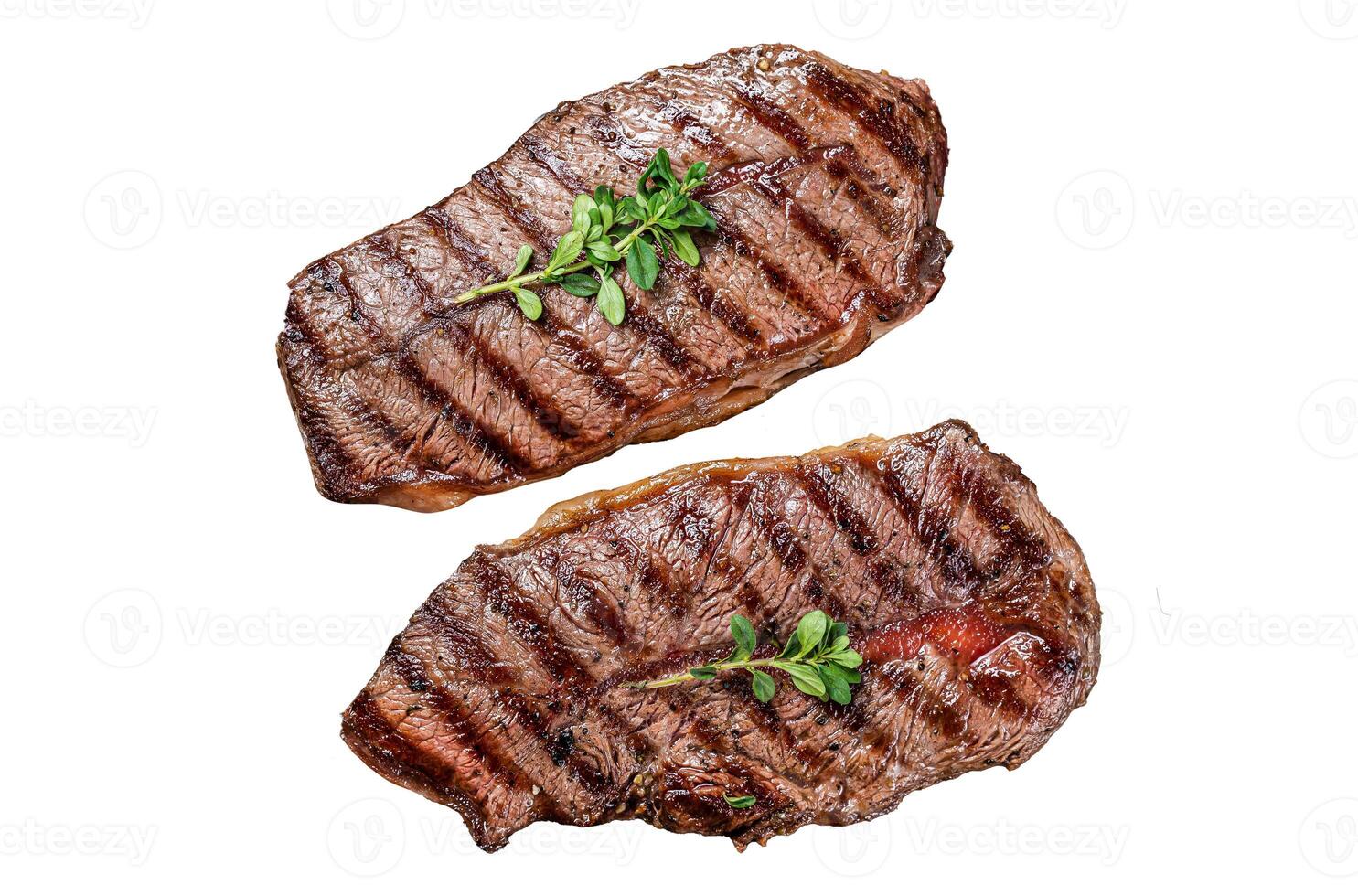 Grilled Top Blade or flat iron beef meat steaks. Isolated, white background. photo