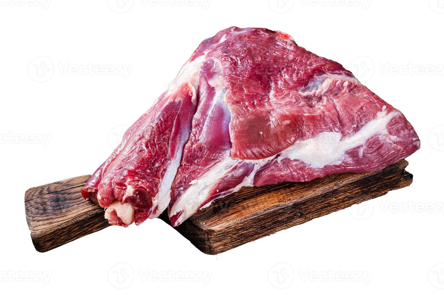 Raw lamb mutton thigh on butcher table. Isolated, white background. photo