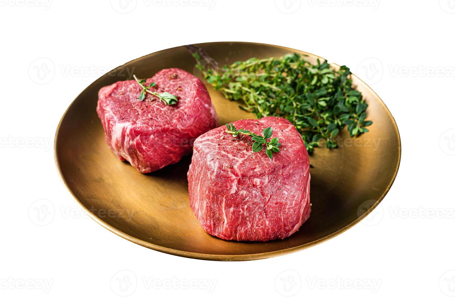 Dry aged Fillet Mignon Beef steak with herbs, raw marble meat. Isolated on white background. Top view. photo