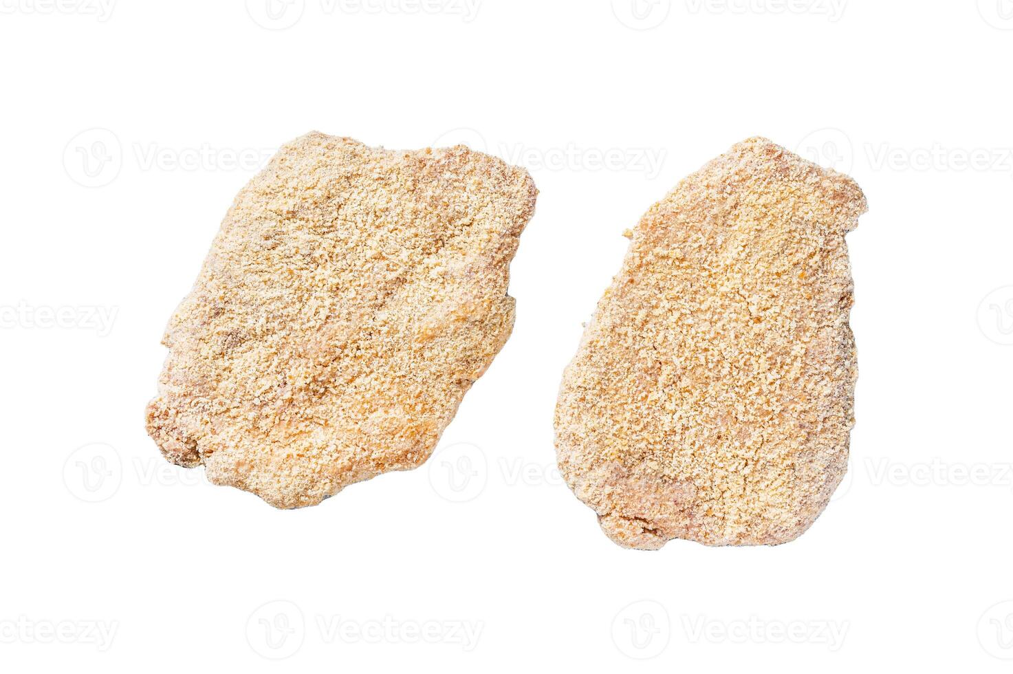 Raw chicken schnitzel Escalope in breadcrumbs. Isolated on white background, top view. photo