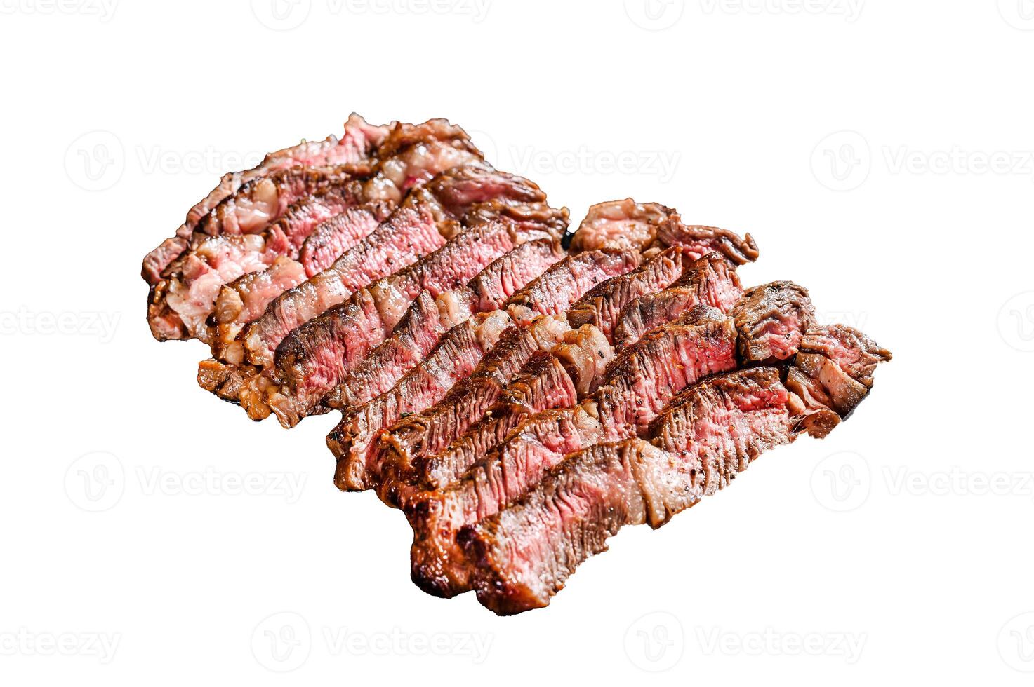 Sliced Grilled beef marbled rare steak. Chuck eye roll Isolated on white background. Top view. photo