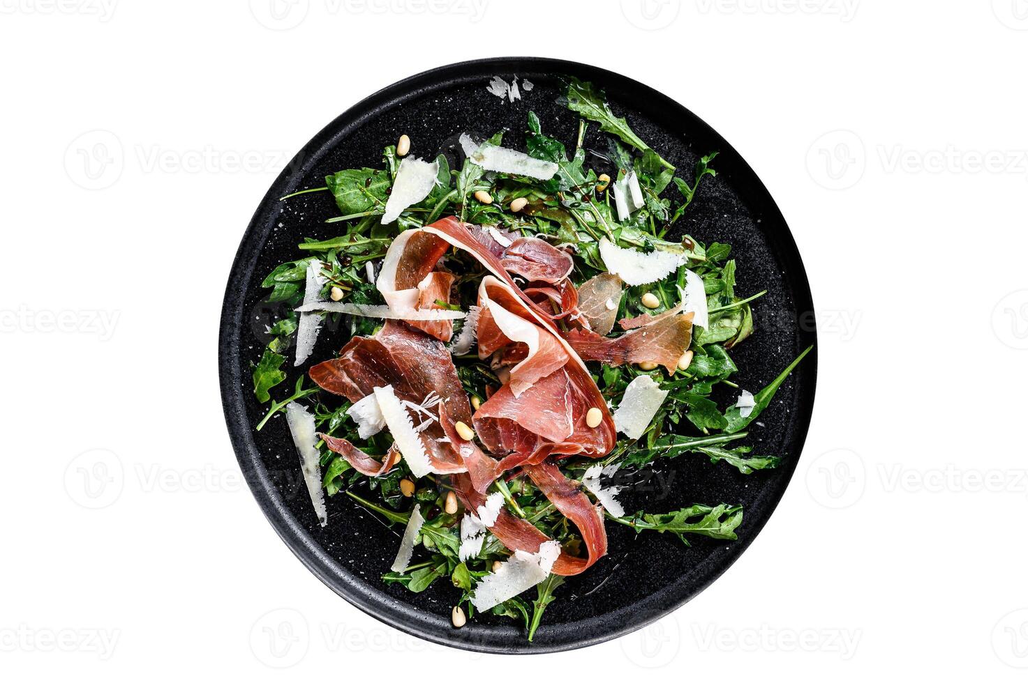 Salad with Parma, prosciutto ham, arugula and Parmesan. Isolated on white background. photo