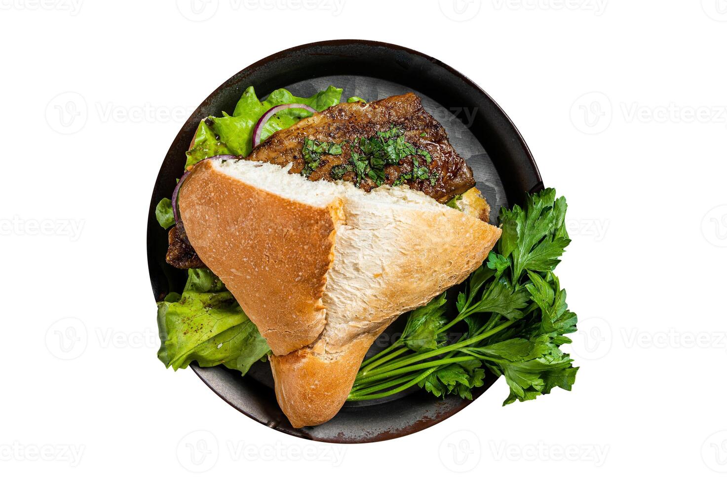 Sandwich balik Ekmek with grilled fillet of mackerel fish, tomatoes, onions and lettuce. Isolated on white background. photo