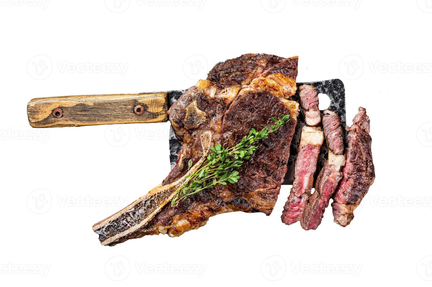 Dry aged grilled Tomahawk or cowboy beef meat steak on a meat cleaver. Isolated, white background. photo