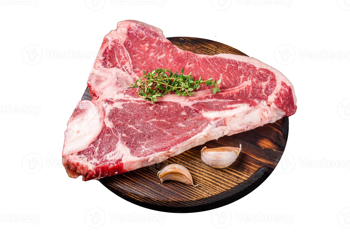 Raw Porterhouse steak, marbled beef meat on a wooden board. Isolated on white background. photo
