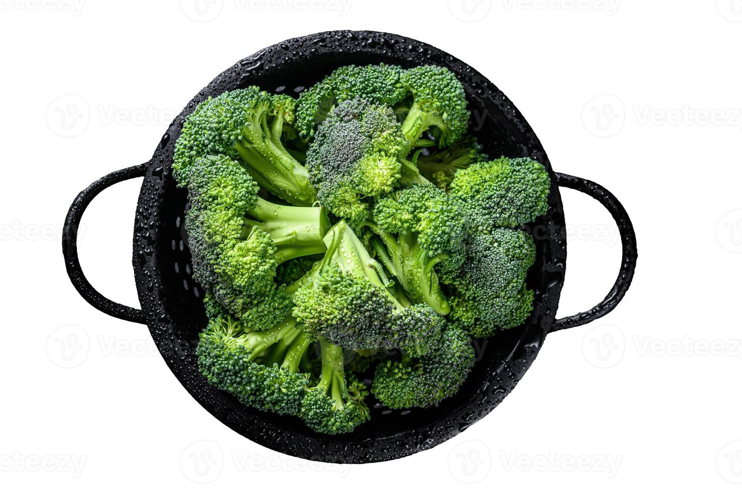 Organic Raw green broccoli cabbage in a colander. Isolated on white background. Top view. photo