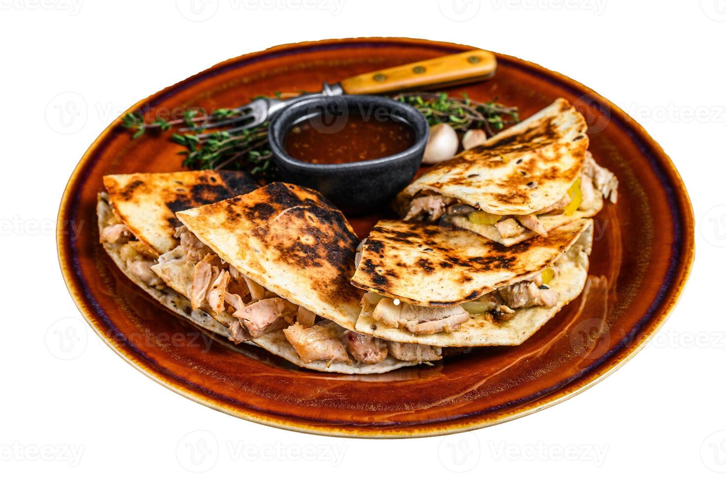 Mexican quesadilla with chicken, paprika, cheese and cilantro on wooden cutting board. Isolated on white background. photo