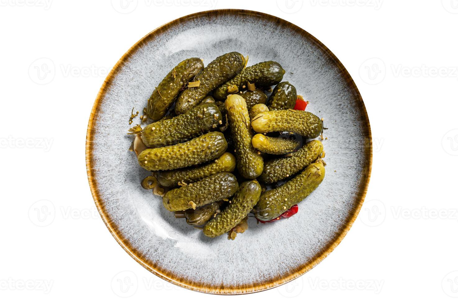 Plate with Pickled gherkins cucumbers on wooden board. Isolated on white background. photo