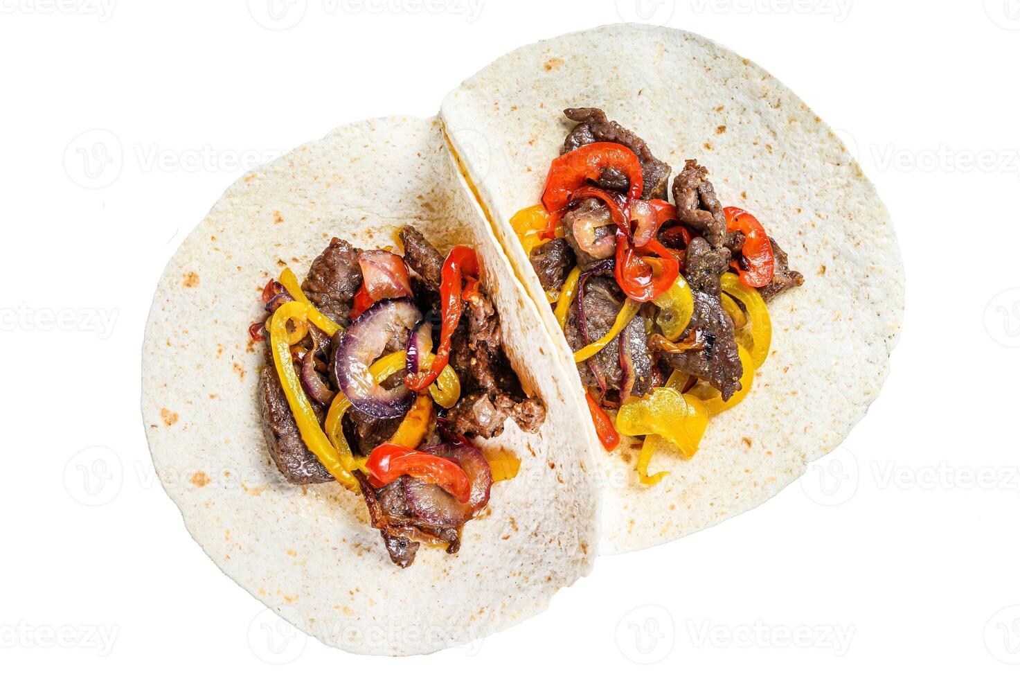Fajitas with beef meat stripes, colored bell pepper and onions, served with tortillas and salsa. Isolated on white background, Top view. photo