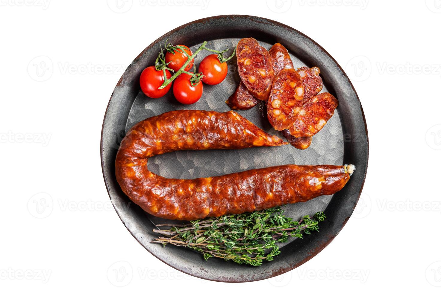 Sliced Chorizo sausage, slices of dry cured pork with herbs and spices. Isolated on white background. photo