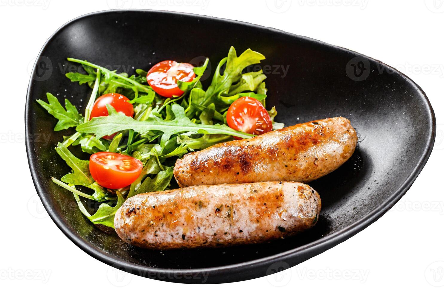 Grilled pork sausages with tomato and arugula salad. Isolated on white background. Top view. photo