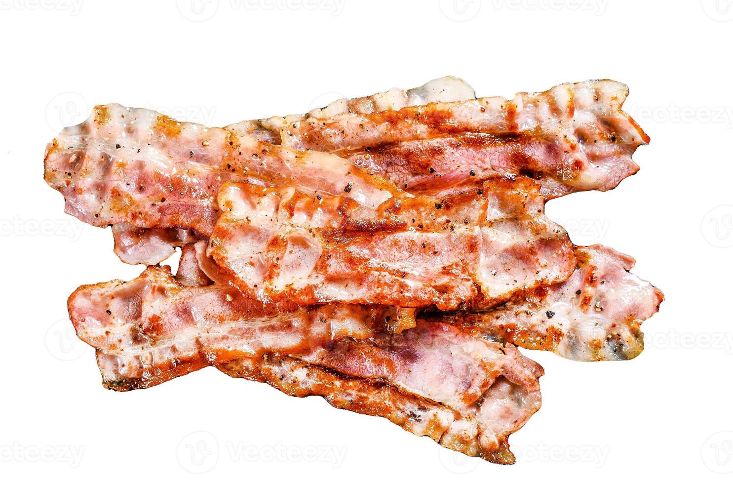 Cooked sizzling hot tasty crispy bacon. Isolated on white background. Top view. photo