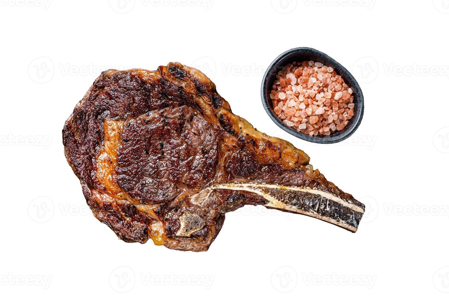 Grilled cowboy or rib eye with bone beef steak. Isolated, white background. photo