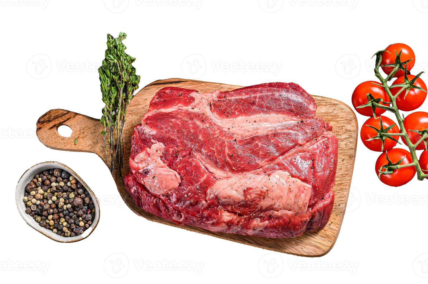Fresh raw beef marbled steak. Chuck eye roll on a cleaver. Isolate, white background. photo