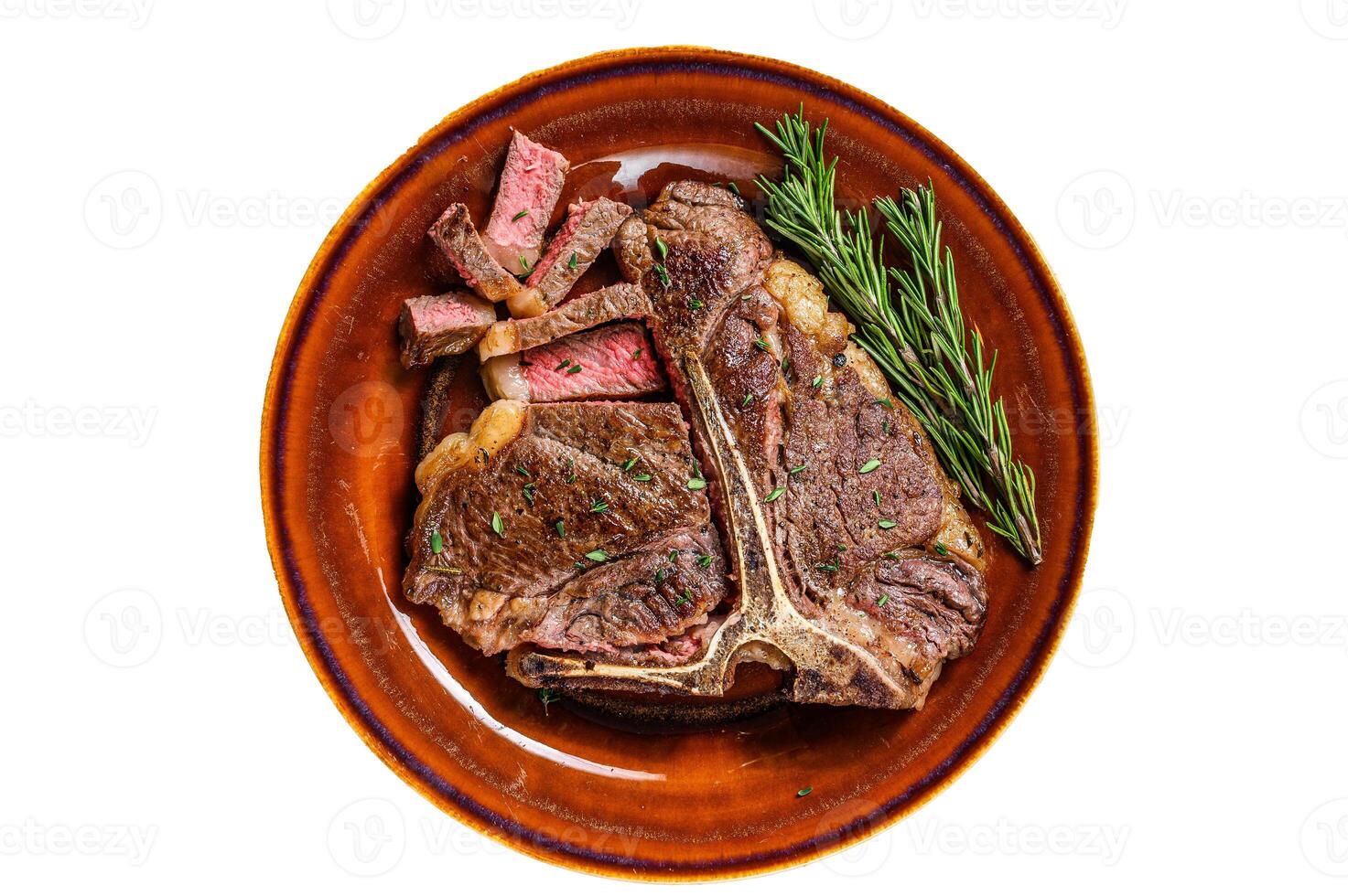 Barbecue Roast porterhouse or t bone beef meat Steak on a rustic plate. Isolated on white background. photo