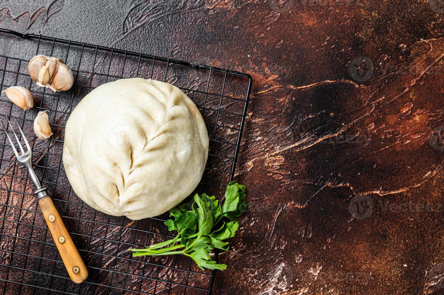 Pyan-se, Pyanse - Traditional Korean steamed pie bun with vegetable and meat. Dark background. Top view. Copy space photo