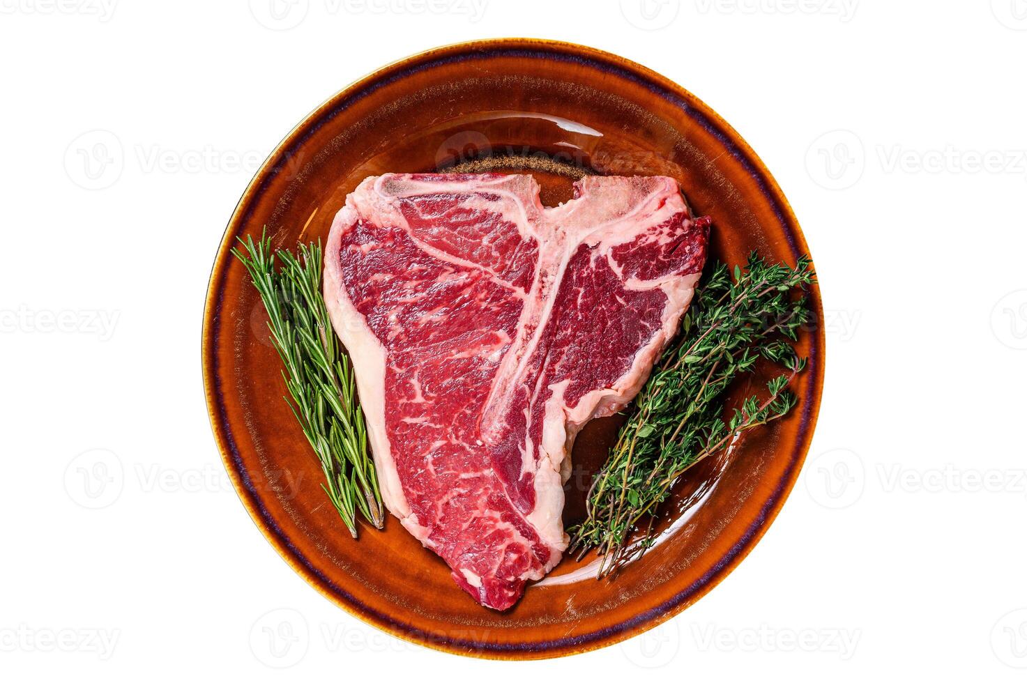 Raw porterhouse beef meat Steak with herbs on a plate. Isolated on white background. photo
