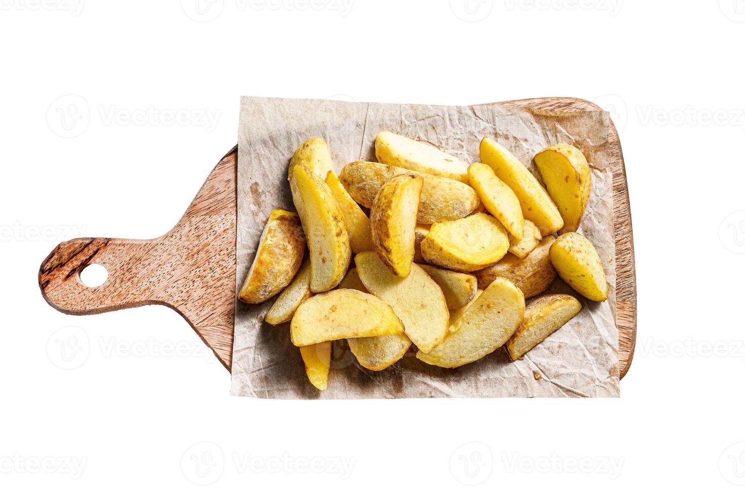 Frozen French Fries potato wedges on a wooden cutting board. Isolated on white background. Top view. photo
