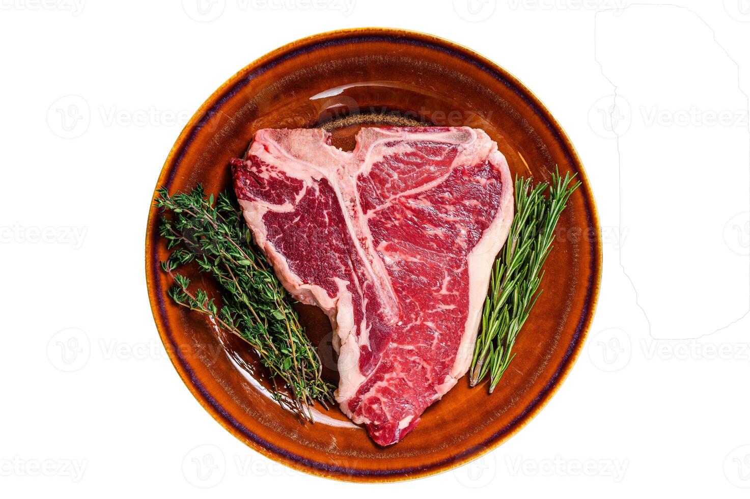 Raw porterhouse beef meat Steak with herbs on a plate. Isolated on white background. photo