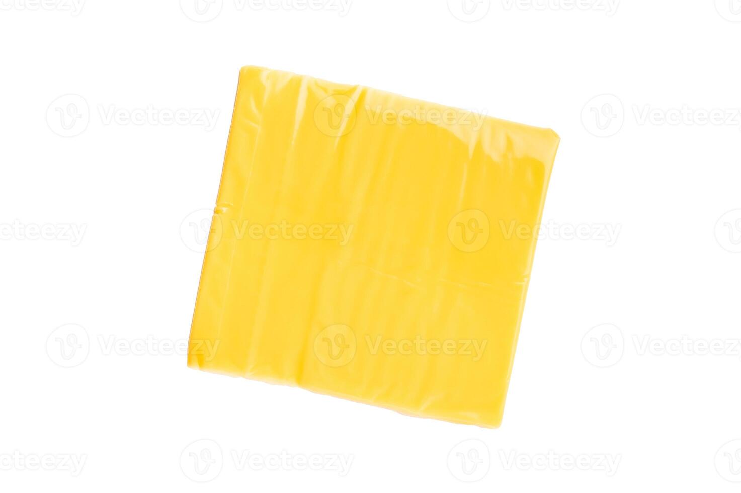 Processed Melted cheese, thin slices for sandwiches isolated on white background photo