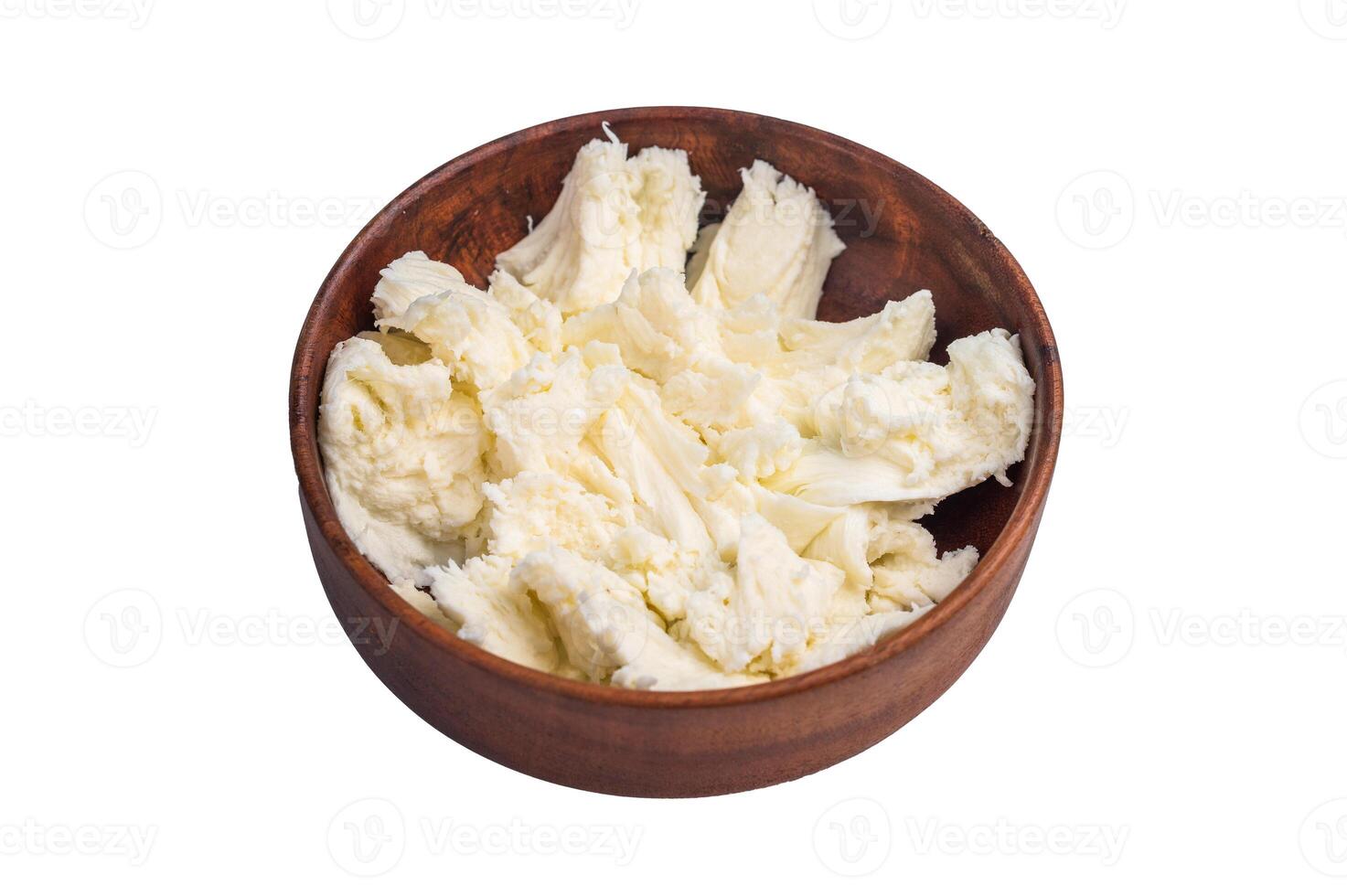 Torn Buffalo white mozzarella cheese isolated on white background. top view photo