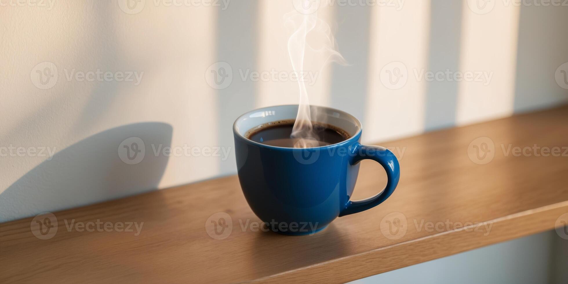 Morning coffee in a blue mug by the window. photo