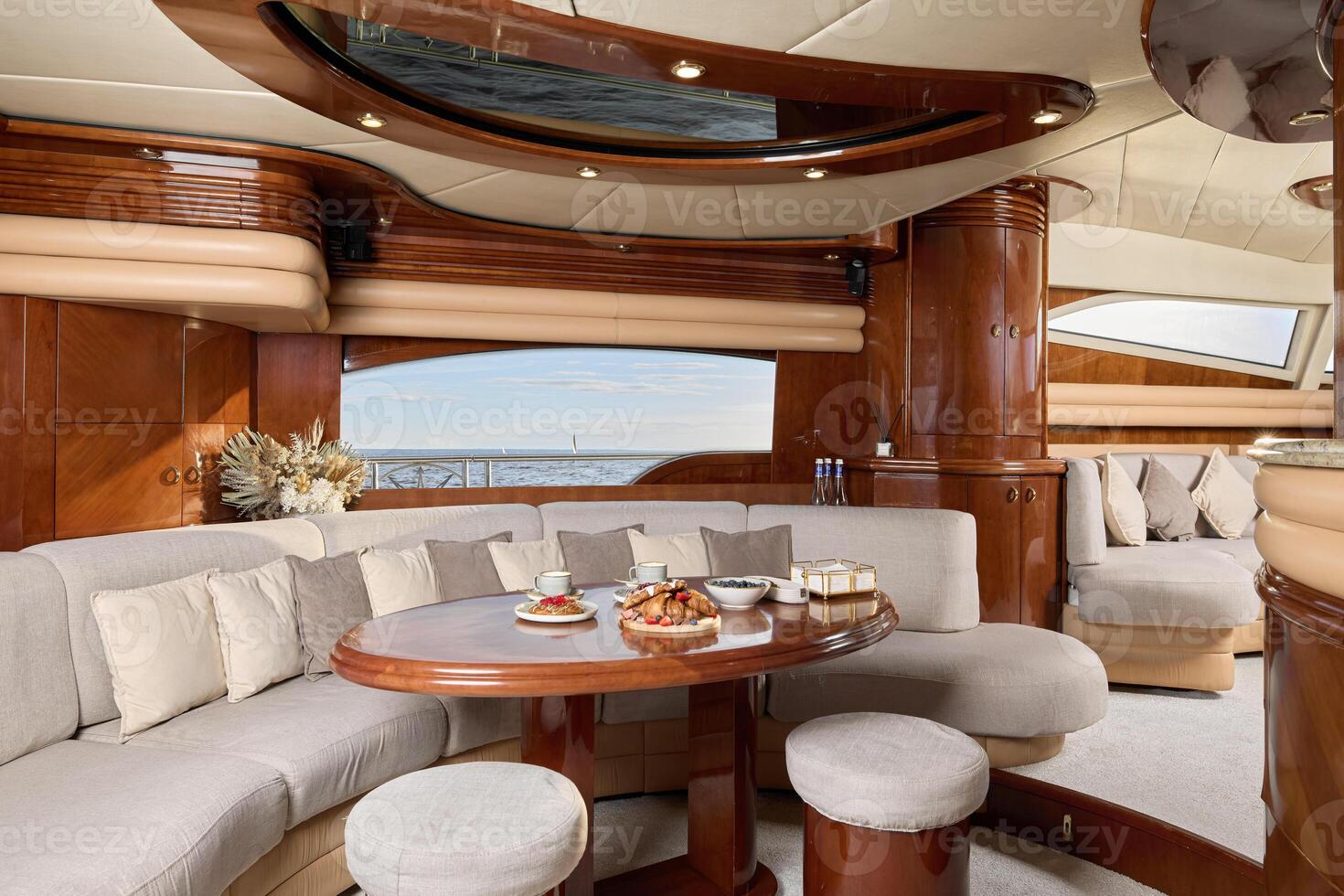 Experience the luxurious yacht interior with its exquisite and elegant dining area photo
