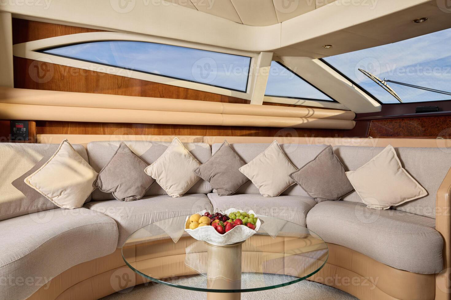 The Elegant Yacht Interior Features Cozy Seatings and an Abundance of Fresh Fruit photo