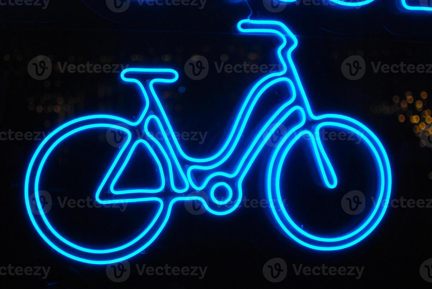 Art Display Featuring a Blue Neon Bicycle Sign that Captures Attention and Ambiance photo