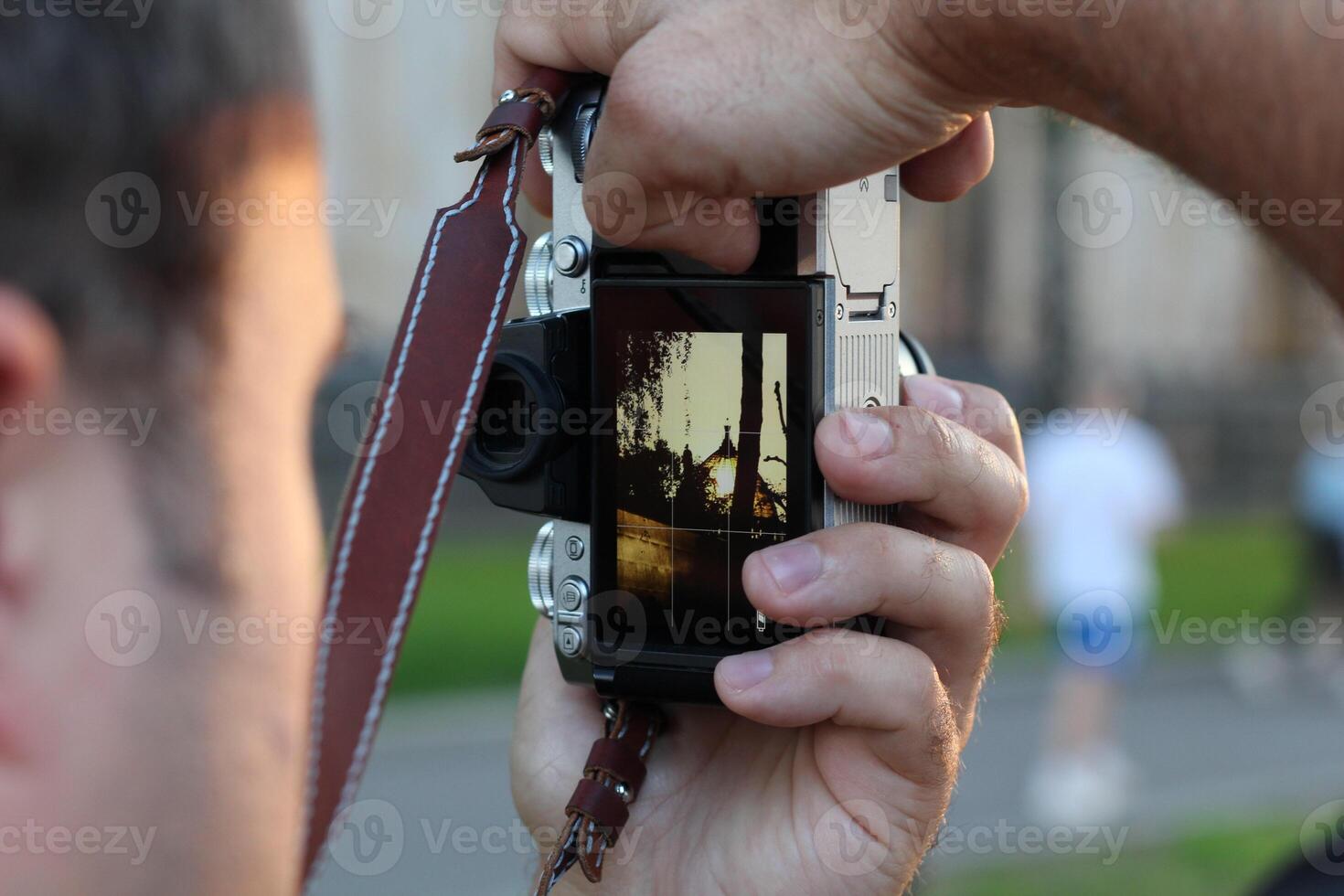 Capturing Beautiful Moments A Dedicated Photographer in Action During Work and Play photo