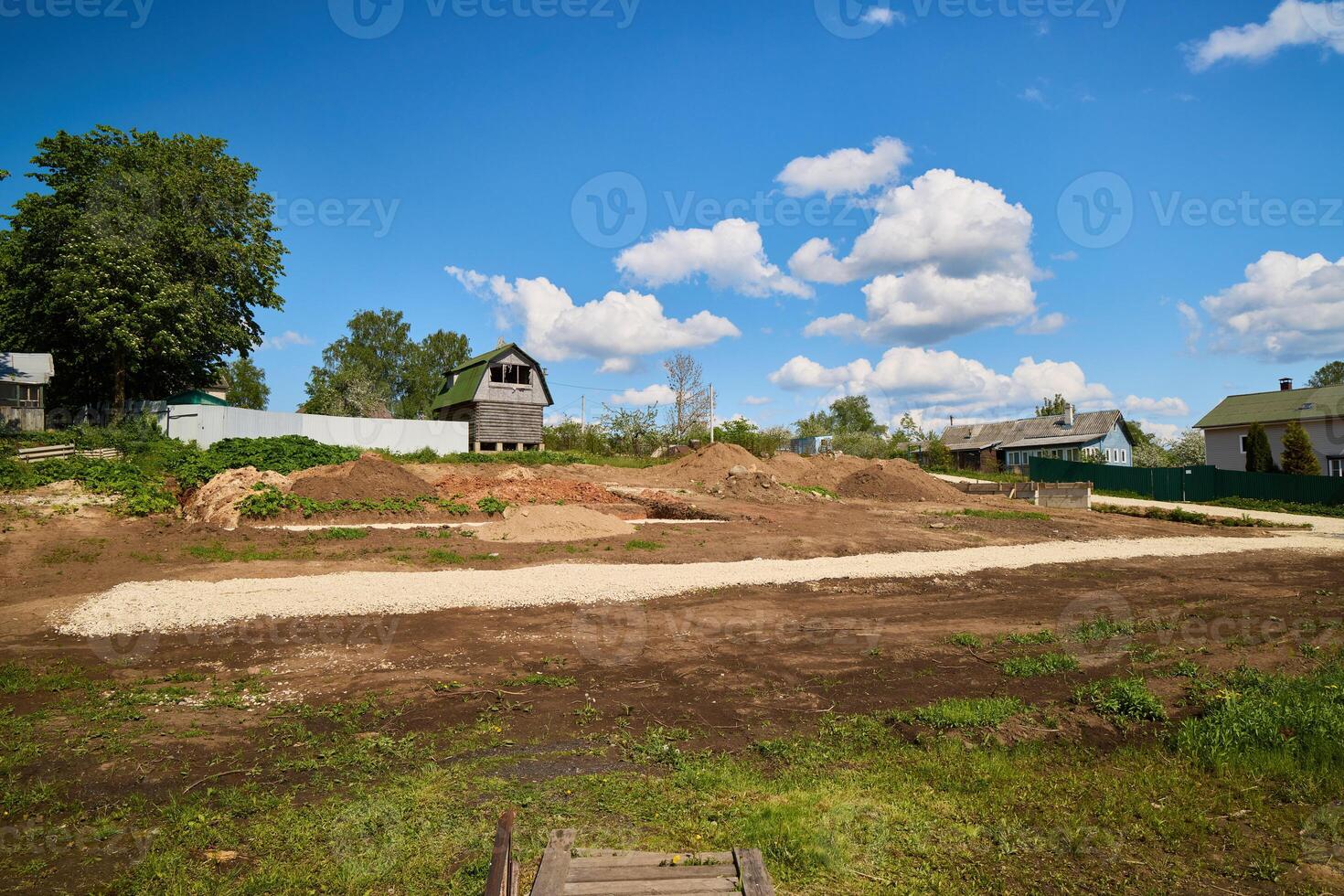 Expansive Open Land Available for Construction Opportunities Beneath a Bright Blue Sky photo