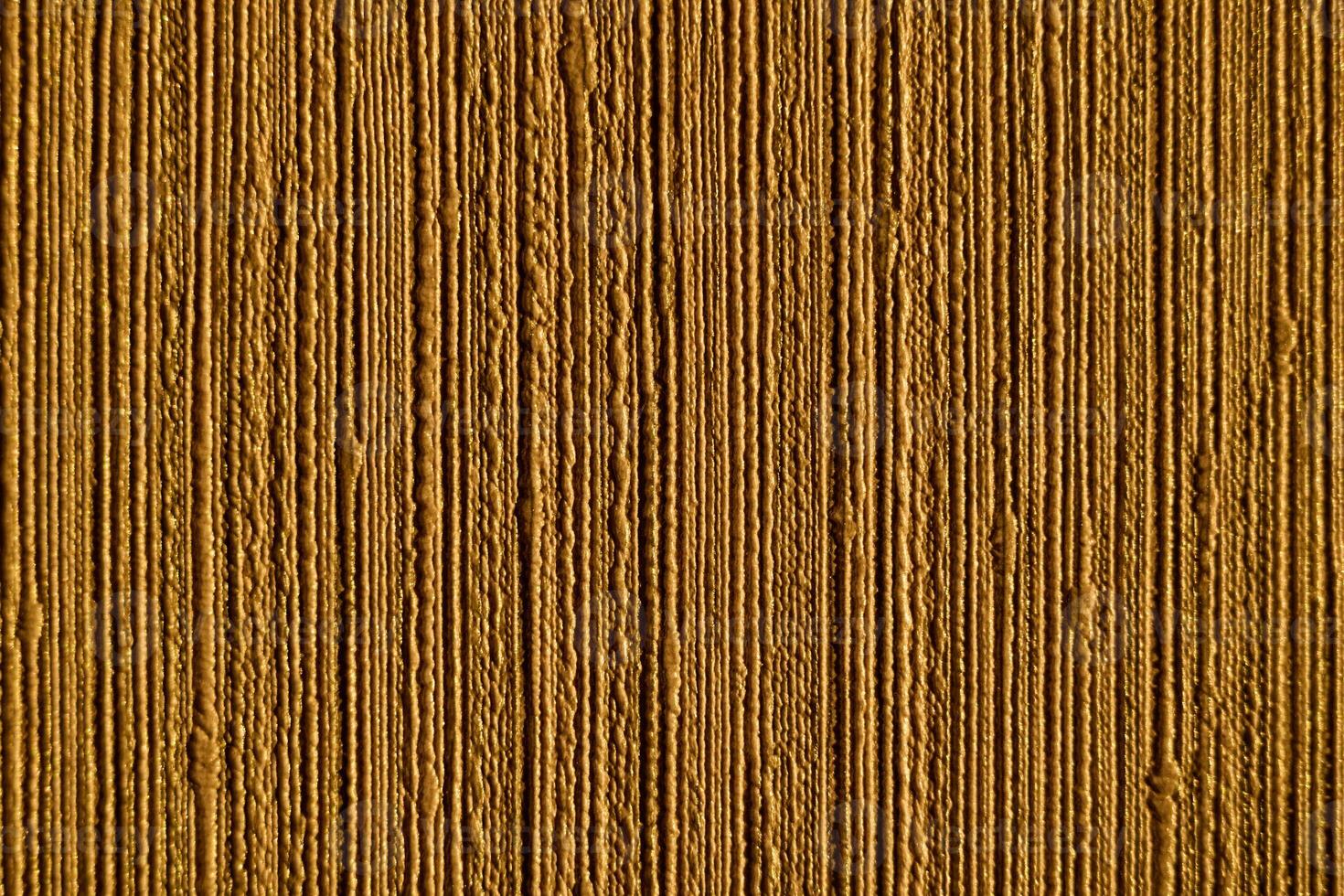 A stunning Textured Gold Background featuring elegant Vertical Lines for amazing visuals photo