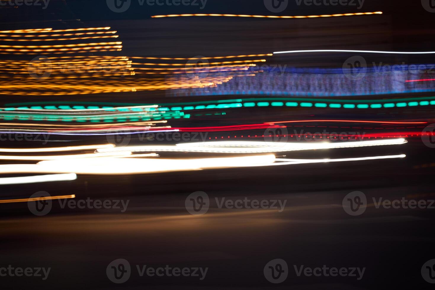 Dynamic Night Scene Featuring Colorful Light Trails That Captivate and Mesmerize Viewers photo