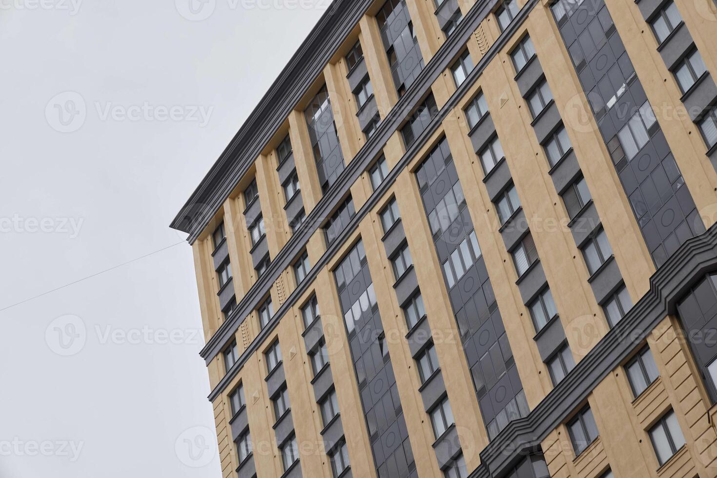 The modern architectural building design within a bustling urban setting emphasizes creativity photo