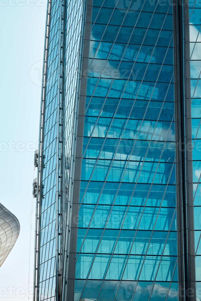 Modern Glass Skyscraper Architecture that Incorporates Reflections in its Design and Structure photo