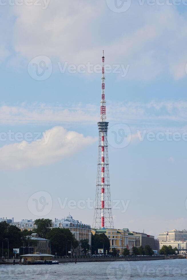An Iconic Tower Against a Blue Sky, Showcasing Modern Architecture and Design Elements photo
