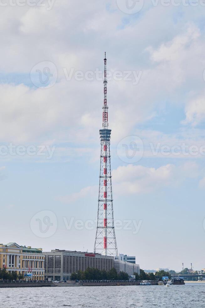 This impressive Television Tower stands tall, overseeing the beautiful river and urban landscape photo