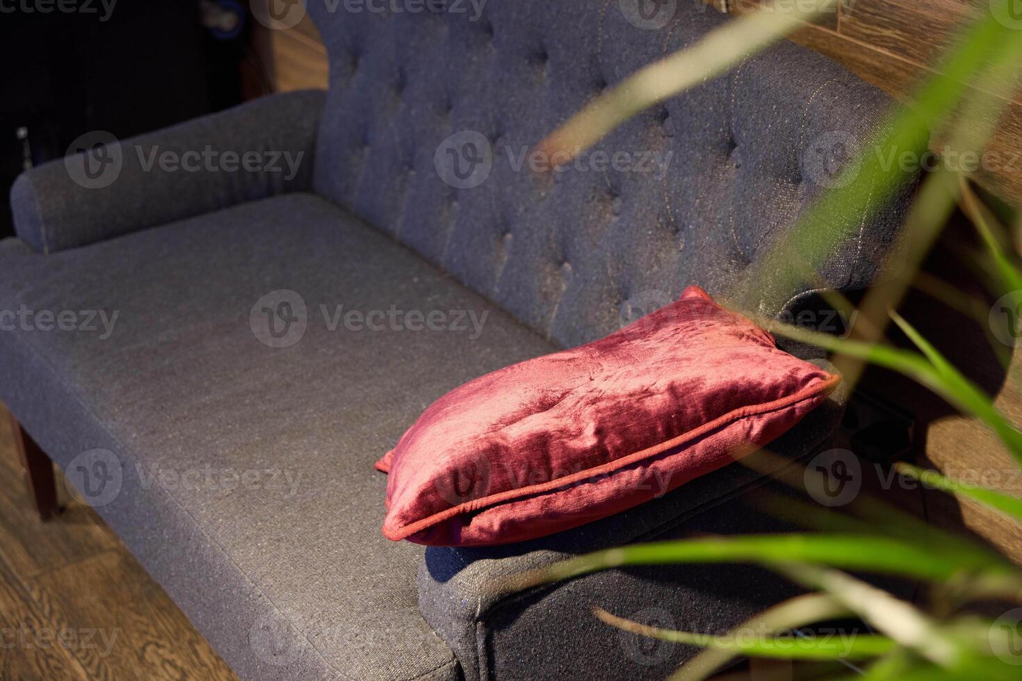 Cozy Sofa with Decorative Pillows Enhancing a Modern Interior Space and Warm Ambiance photo